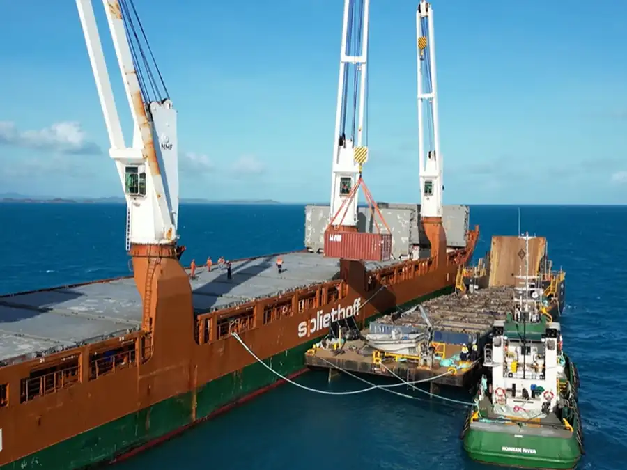 A cargo barge offshore in the Torres Strait.