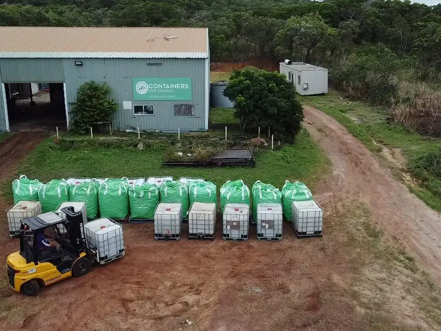 The Crystal Ailan depot and staged collection bags on Badu Island.